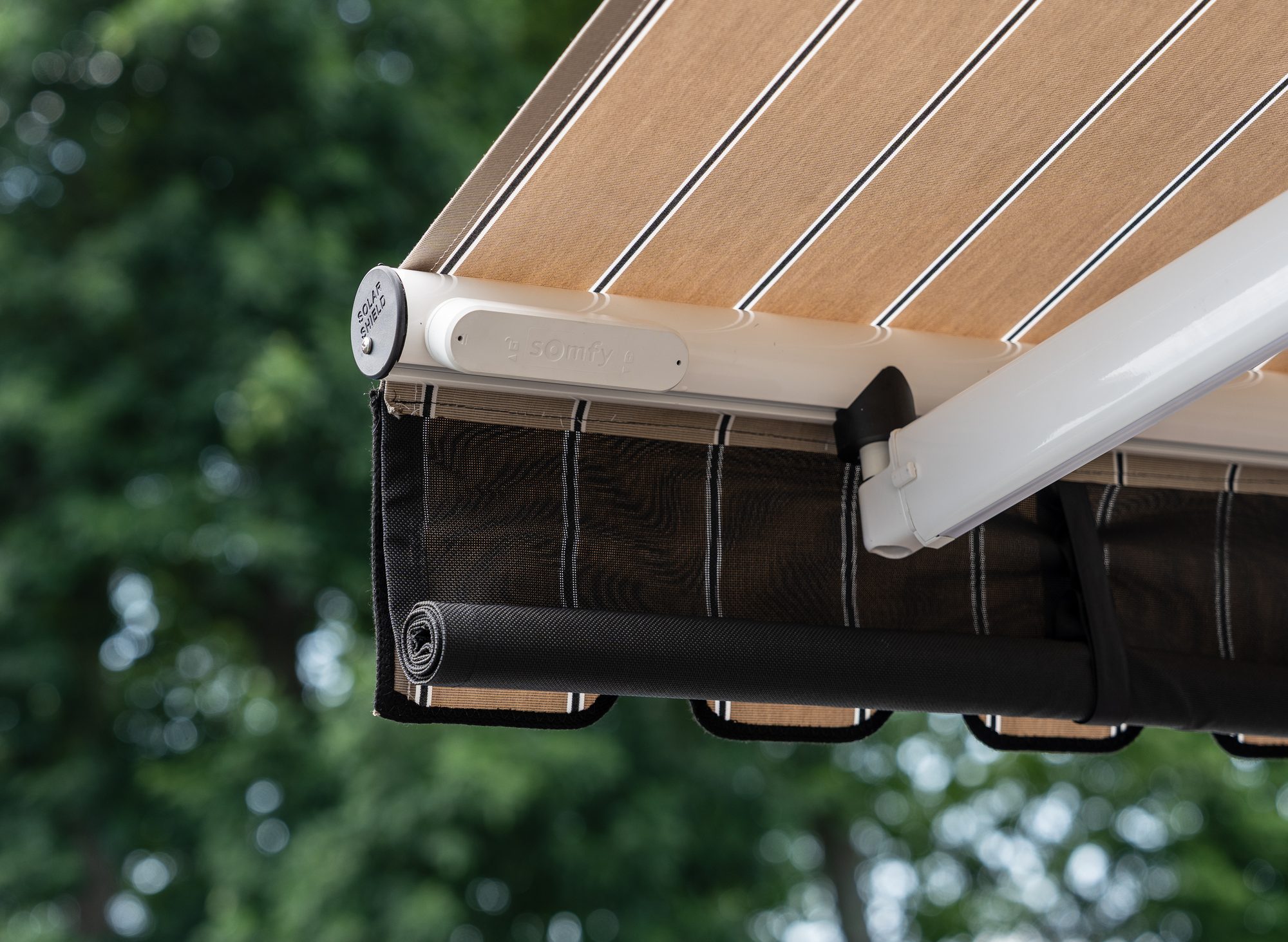 Somfy motor and headrail on a Manchester Awning retractable awning install